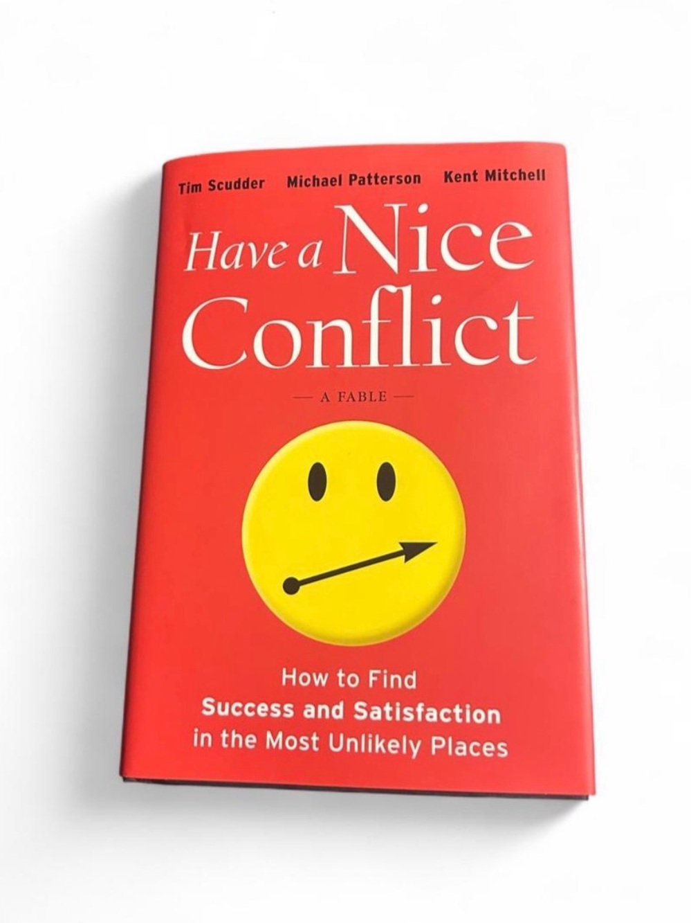 Have a Nice Conflict — Red Hardcover with Yellow Smiley